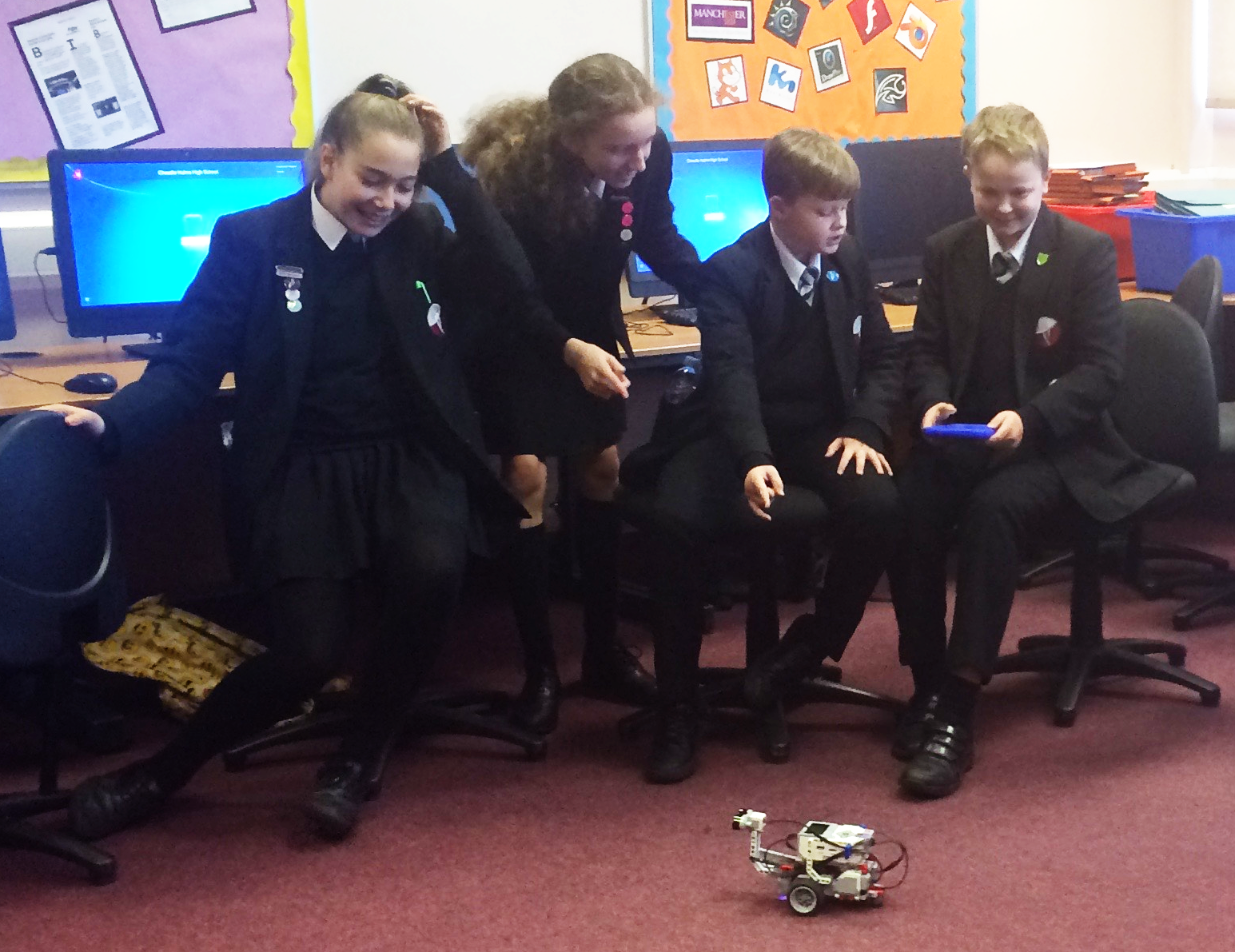 Picture of a Year 7 group working with a Lego Robot